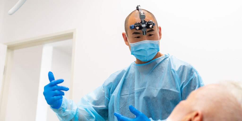 Doctor about to perform dental procedure